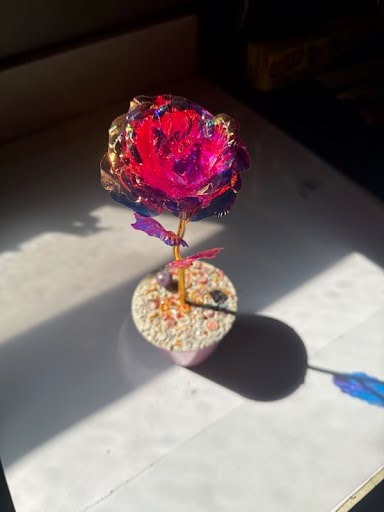 Red Tupac Rose concrete art - handcrafted metallic colored rose in concrete base